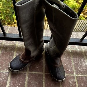 Sorrel riding and rain boots.